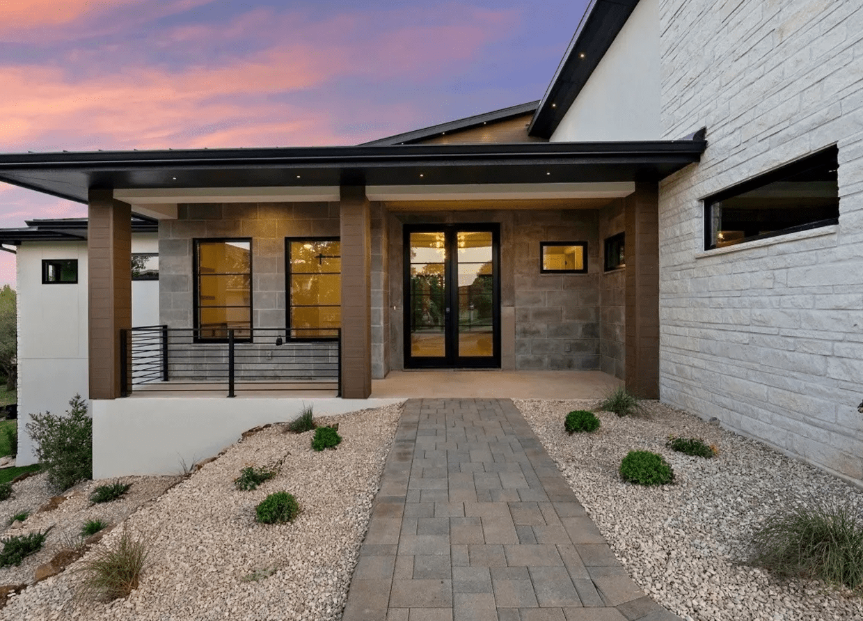 Stylish front porch under colorful sky